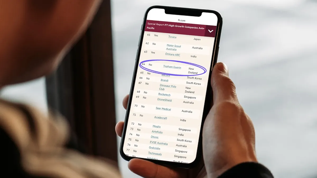A phone showing the Financial Times’ FT High-Growth Companies Asia-Pacific list with Topham Guerin circled.